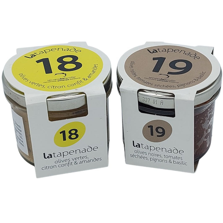 Tapenade von der schwarzen Oliven mit getrockeneter Tomaten, Pinienkerne und Basilikum